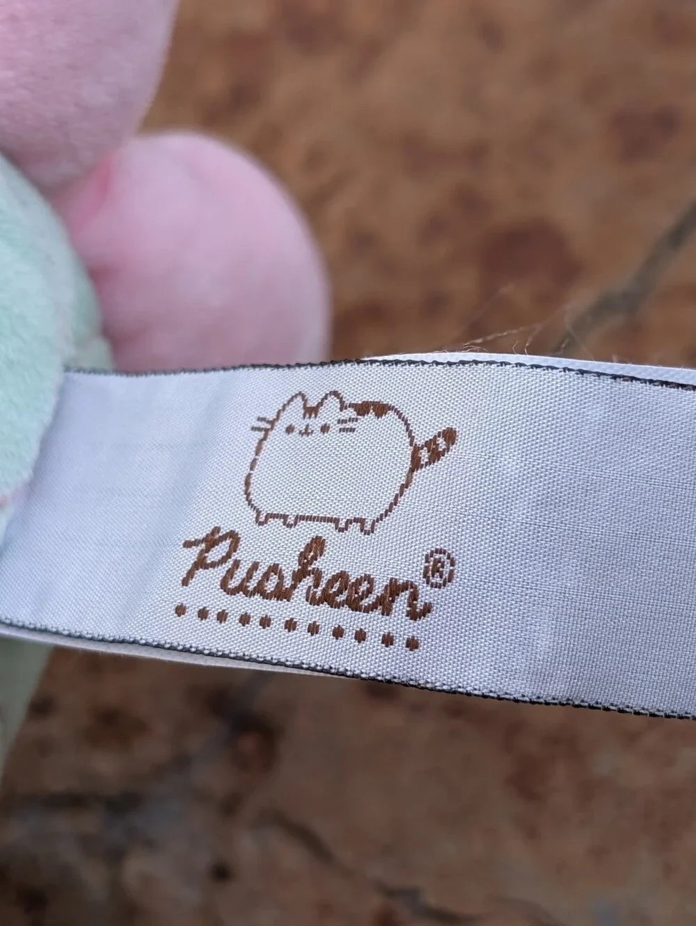 Plusheen gund sign
